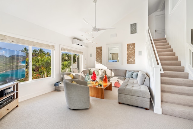 carpeted living room featuring a wall mounted AC, ceiling fan, and high vaulted ceiling