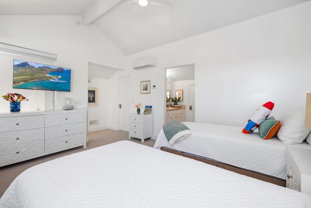 carpeted bedroom featuring vaulted ceiling with beams, an AC wall unit, and ensuite bath