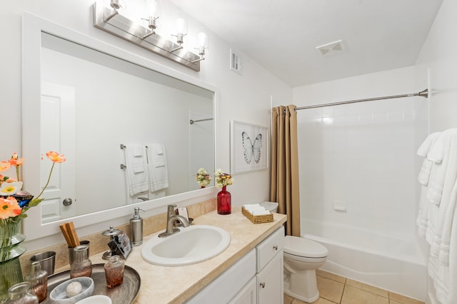 full bathroom featuring tile patterned floors, shower / bath combination with curtain, toilet, and vanity