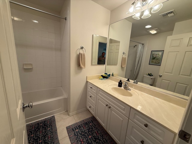 bathroom with tile patterned flooring, vanity, and shower / bath combination with curtain