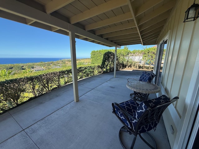 view of patio / terrace featuring a water view