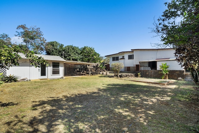 view of yard with a carport