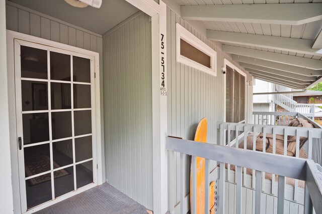 entrance to property featuring ceiling fan