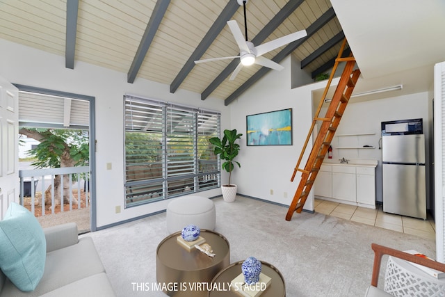 living room with ceiling fan, wooden ceiling, light carpet, and beamed ceiling