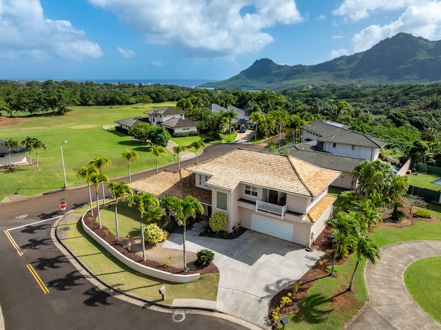 birds eye view of property featuring a mountain view