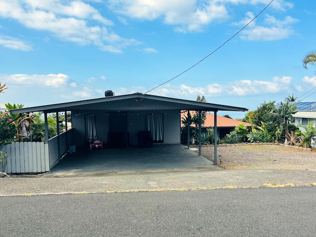 view of front of house with a carport