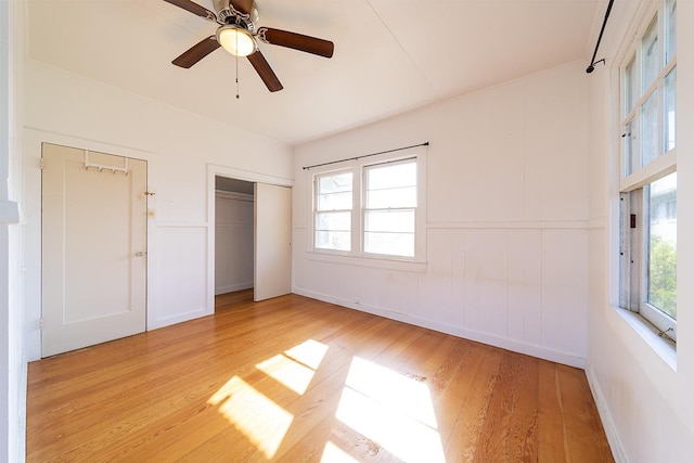 unfurnished bedroom featuring ceiling fan and light hardwood / wood-style floors