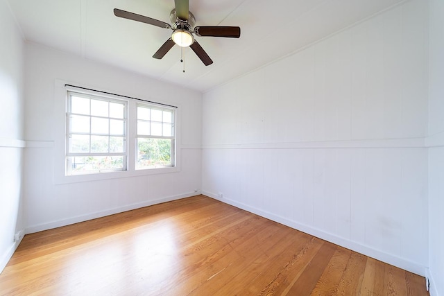 unfurnished room featuring ceiling fan and light hardwood / wood-style floors