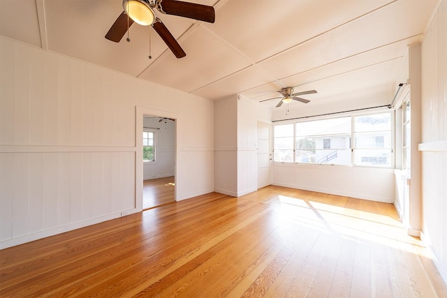 spare room with ceiling fan and light hardwood / wood-style flooring