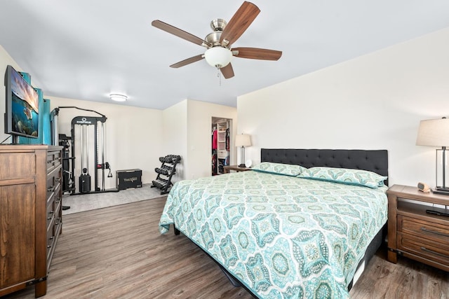 bedroom with hardwood / wood-style flooring and ceiling fan