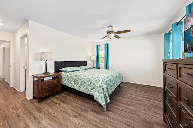 bedroom featuring hardwood / wood-style flooring and ceiling fan