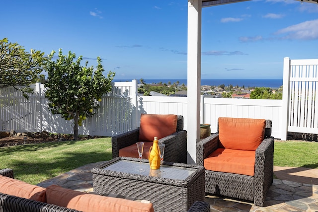 view of patio with a water view