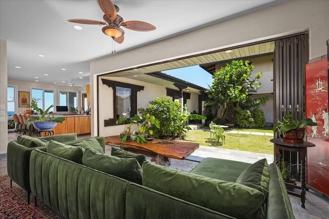 living room with ceiling fan