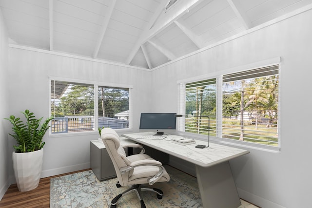 office area featuring vaulted ceiling with beams, wood-type flooring, wooden ceiling, and a healthy amount of sunlight