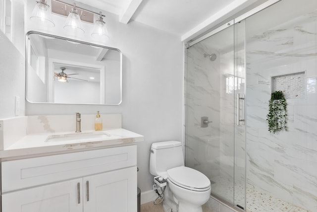 bathroom with vanity, an enclosed shower, ceiling fan, and toilet