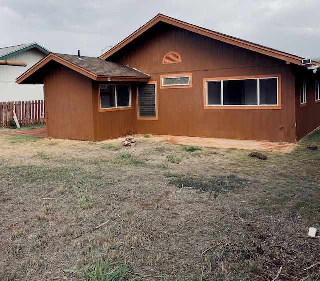 view of property exterior featuring a yard