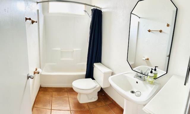 full bathroom with tile patterned floors, sink, shower / bath combo, and toilet