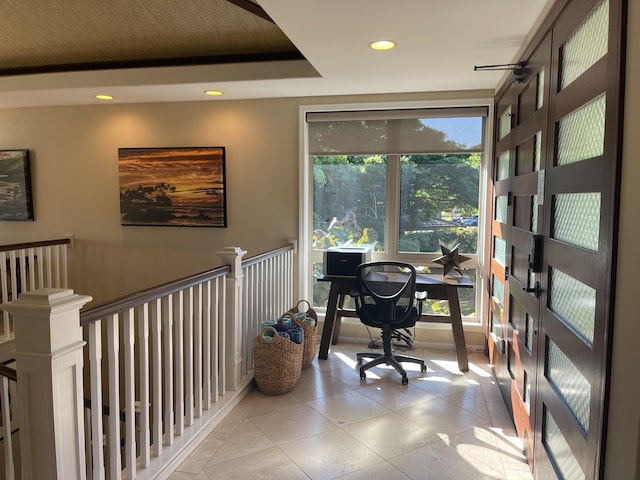 tiled office with french doors and a raised ceiling