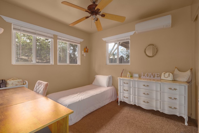 bedroom with ceiling fan, carpet floors, and a wall unit AC