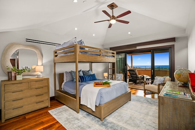 bedroom with dark wood-type flooring, access to exterior, and vaulted ceiling