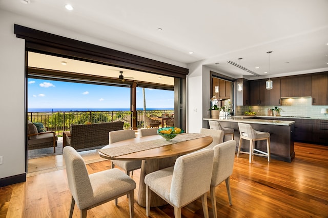 dining room with light wood-type flooring