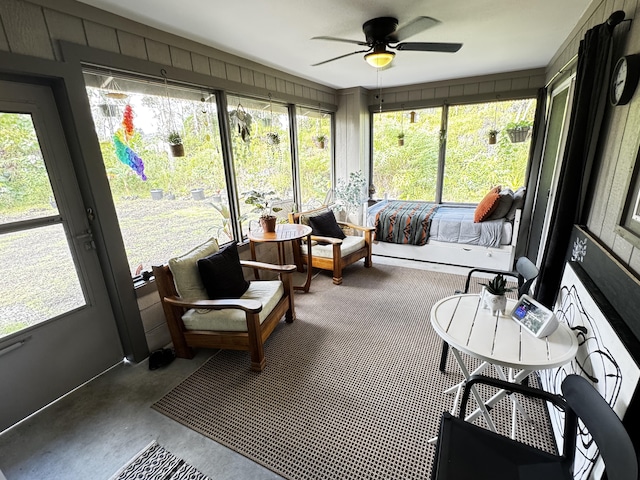 sunroom / solarium with ceiling fan