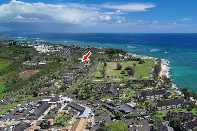 drone / aerial view with a view of the beach and a water view