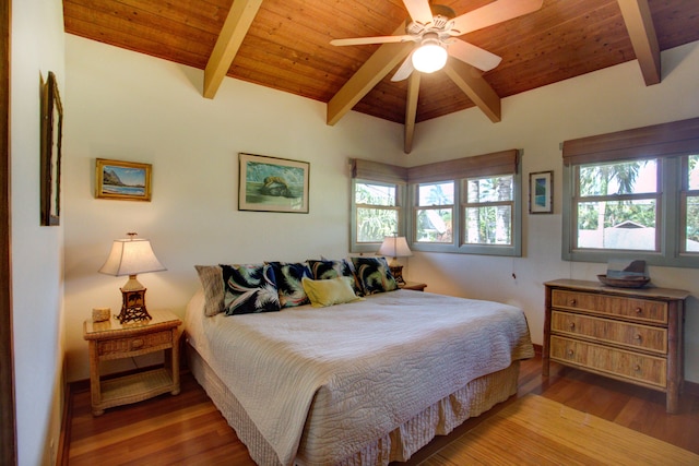 bedroom with ceiling fan, dark hardwood / wood-style floors, wood ceiling, and multiple windows