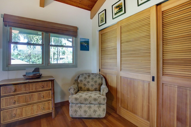 sitting room with dark hardwood / wood-style flooring, lofted ceiling, and wood ceiling