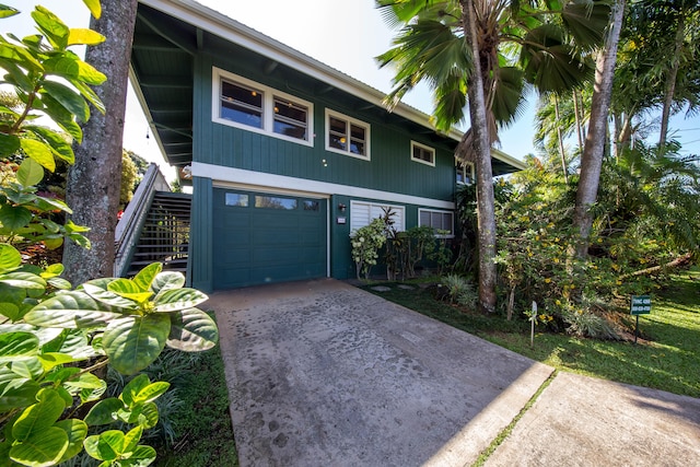 view of front of property with a garage