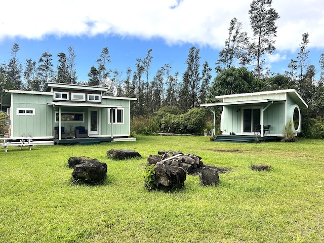 view of yard with covered porch