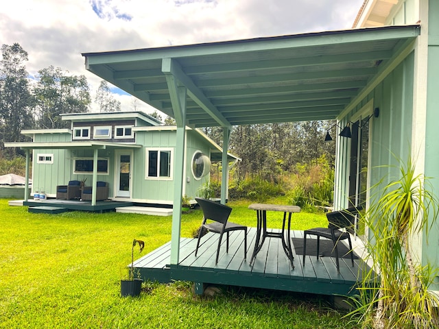 exterior space featuring a wooden deck