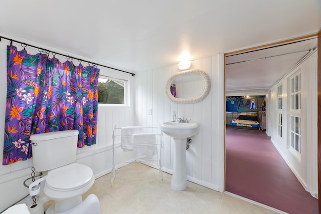 bathroom with sink and toilet