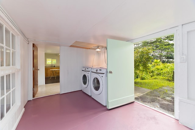 laundry room featuring separate washer and dryer