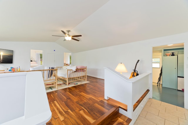 interior space with wood-type flooring and vaulted ceiling