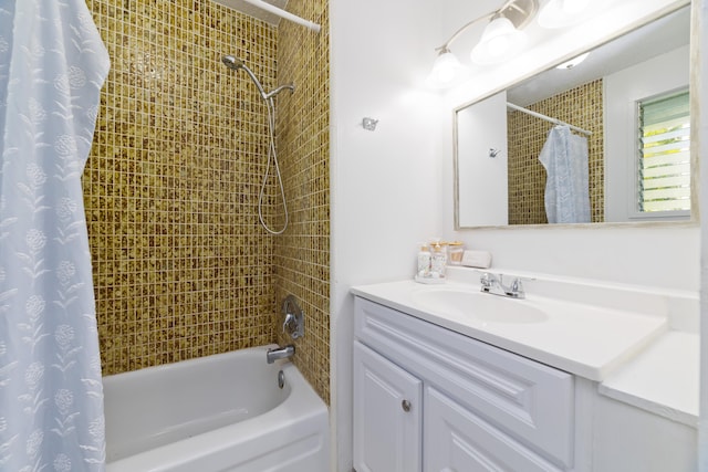 bathroom featuring vanity and shower / bath combo