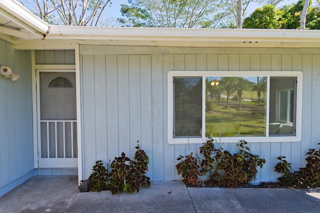 entrance to property with a patio area