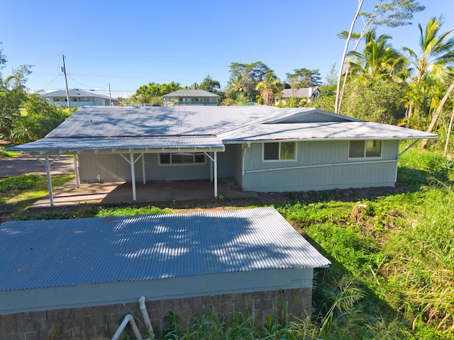 view of front of property featuring a patio