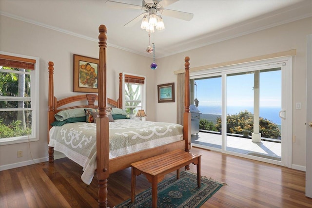 bedroom featuring access to exterior, dark hardwood / wood-style flooring, ceiling fan, and crown molding