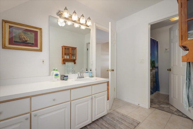 bathroom with vanity and tile patterned floors