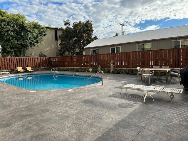 view of pool with a patio