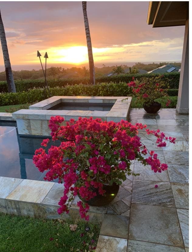 view of pool at dusk