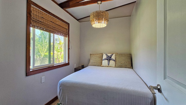 bedroom featuring lofted ceiling