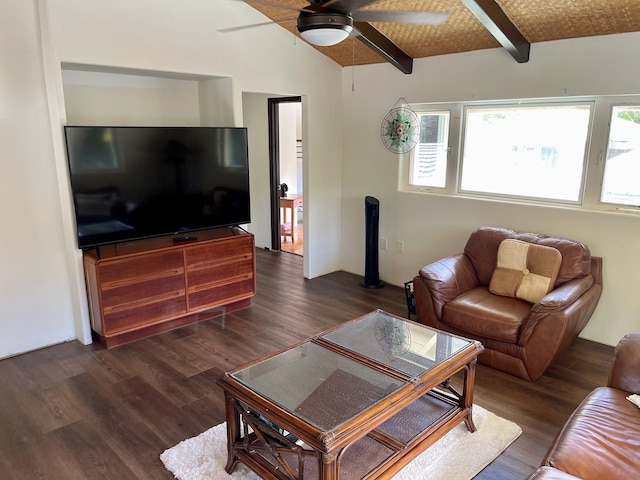 living room with vaulted ceiling with beams, ceiling fan, and dark wood-type flooring