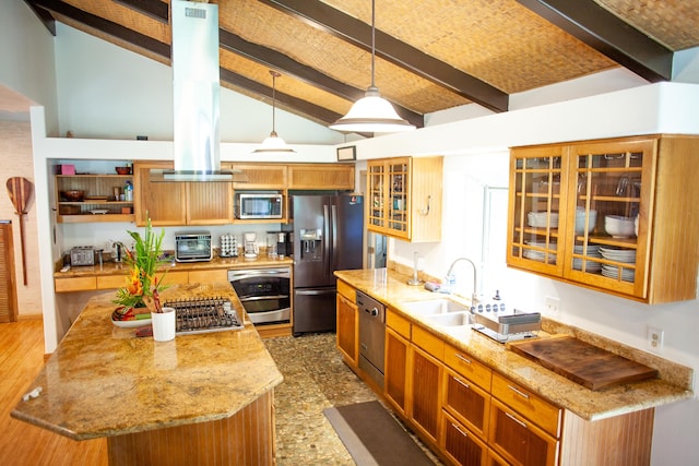 kitchen featuring sink, decorative light fixtures, brick ceiling, island range hood, and appliances with stainless steel finishes