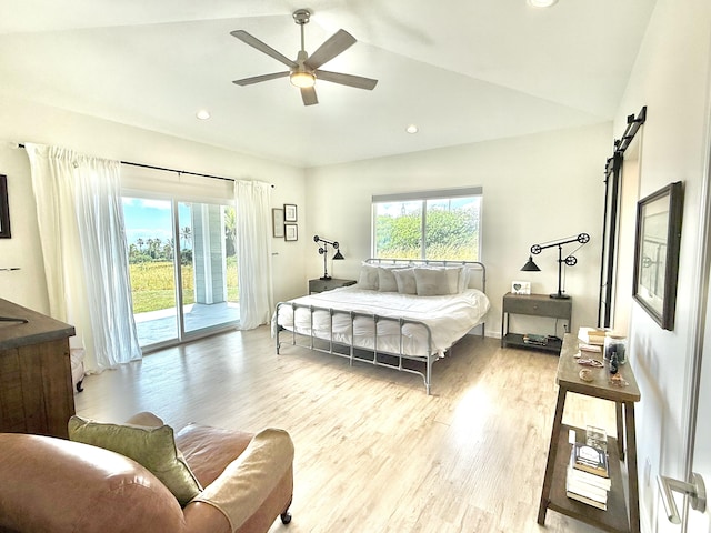 bedroom with access to exterior, ceiling fan, light hardwood / wood-style floors, and multiple windows