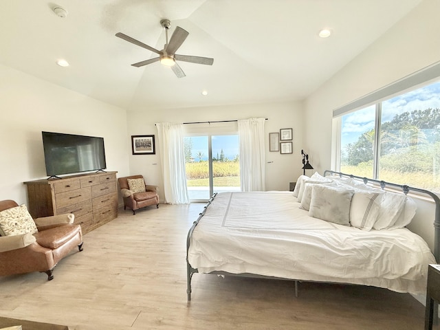 bedroom featuring ceiling fan, light wood-type flooring, access to outside, and lofted ceiling