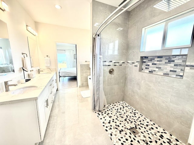 bathroom featuring vanity and walk in shower