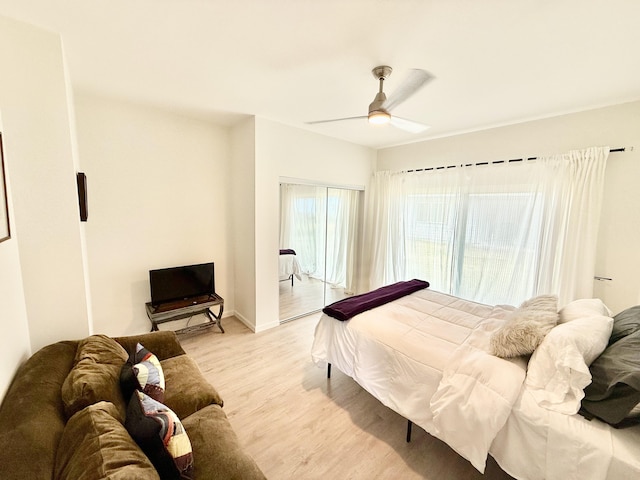 bedroom featuring ceiling fan and light hardwood / wood-style flooring