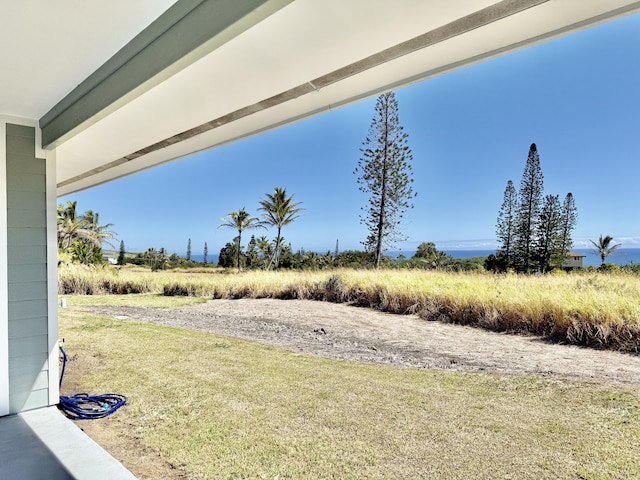 view of yard with a water view